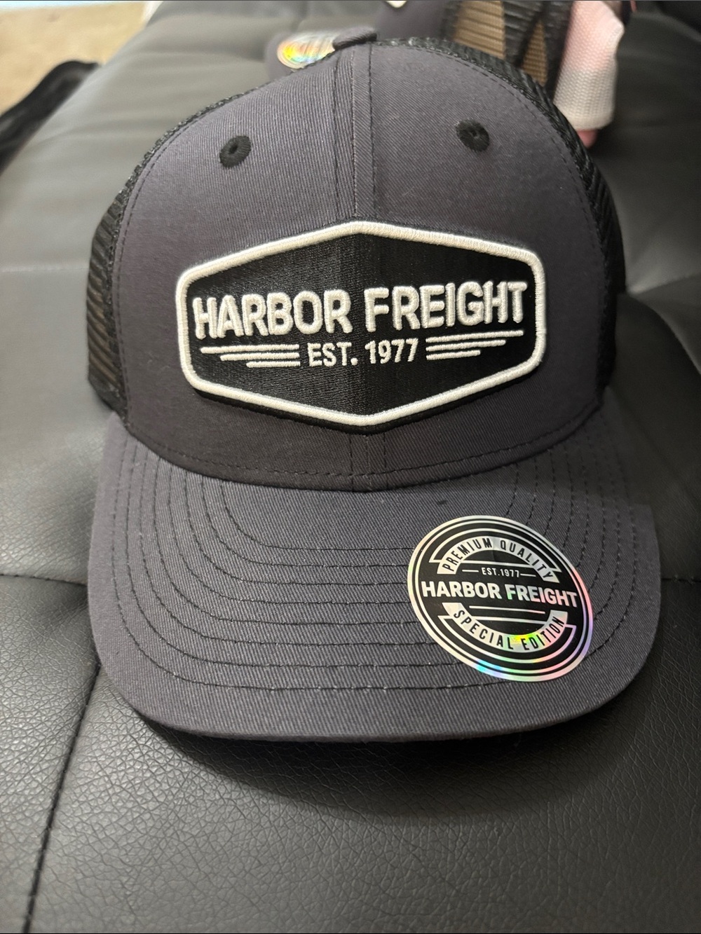 Men’s Black Trucker Hat – Est. 1977 Patch